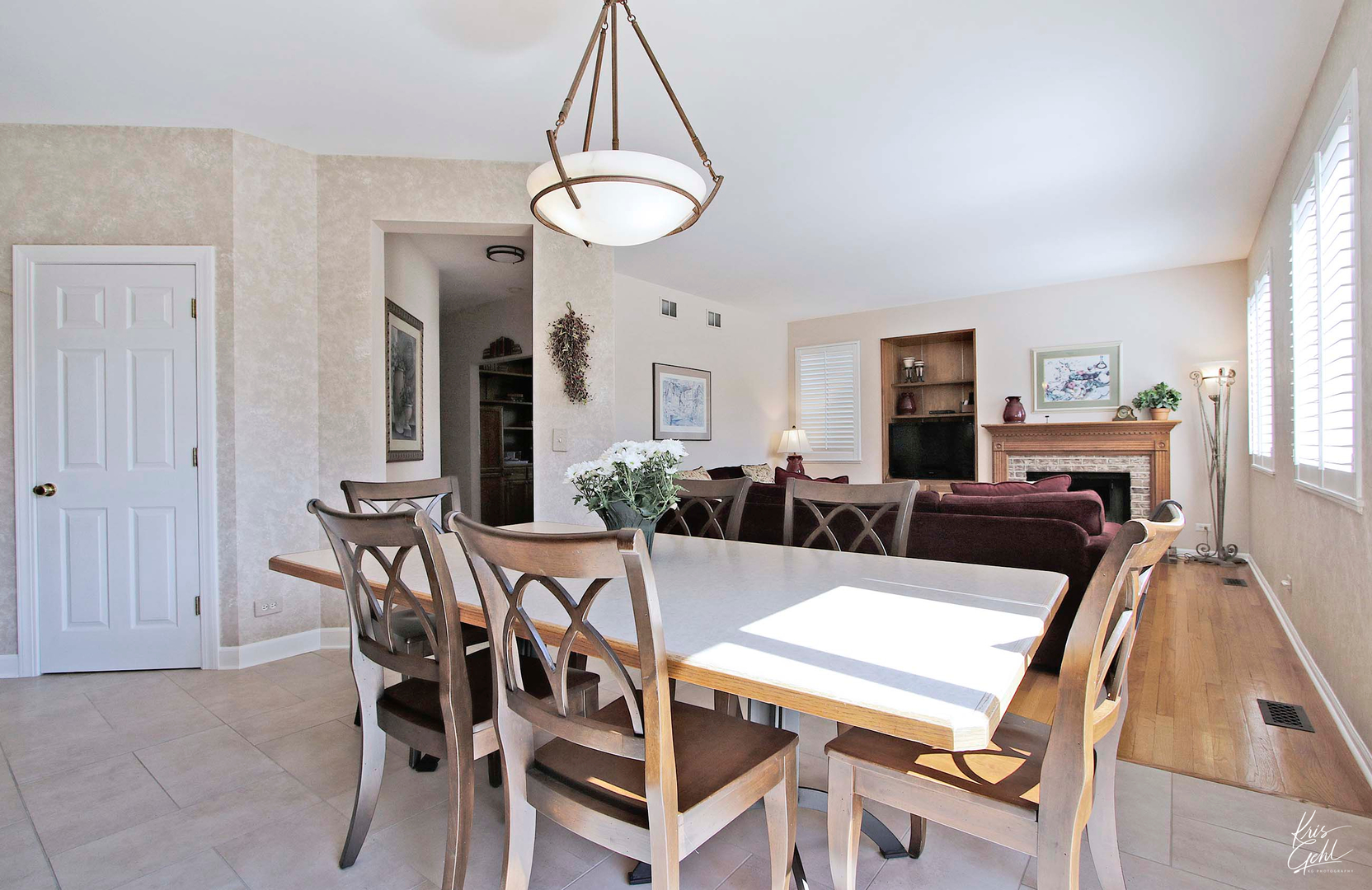 515 Capital Lane Gurnee, IL 60031 - Photo 7 of 32 a view of a dining room with furniture and a chandelier