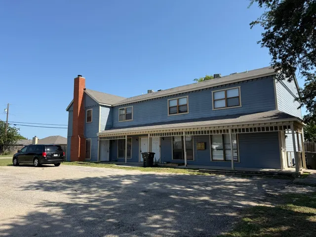 a car parked in front of a building