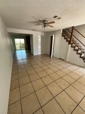a view of a livingroom and entryway