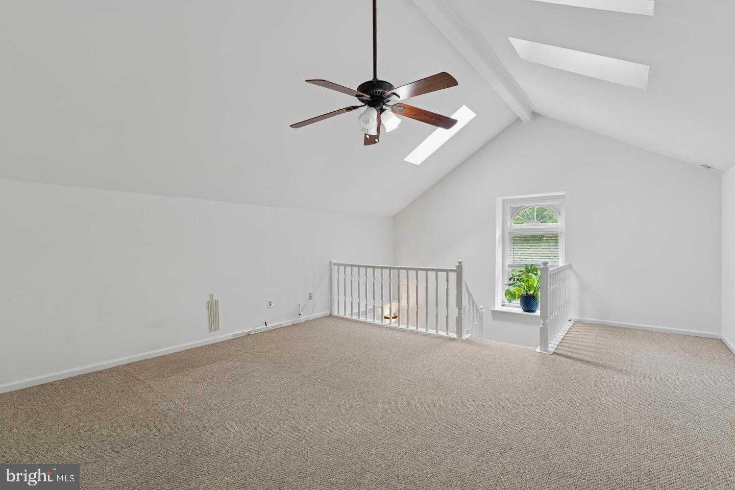 32 Main Street Chesterbrook, PA 19087 - Photo 14 of 20 a view of a livingroom with a ceiling fan and window