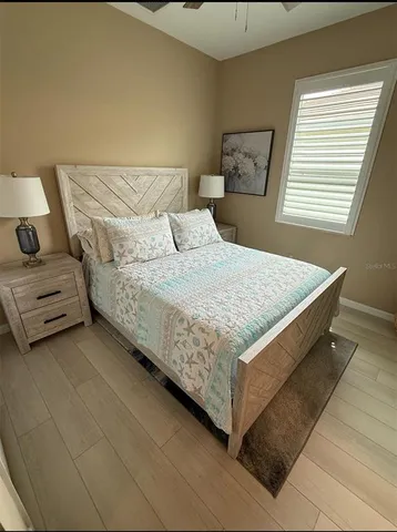 a bathroom with a sink toilet and mirror