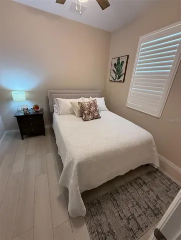 a bathroom with a shower and toilet