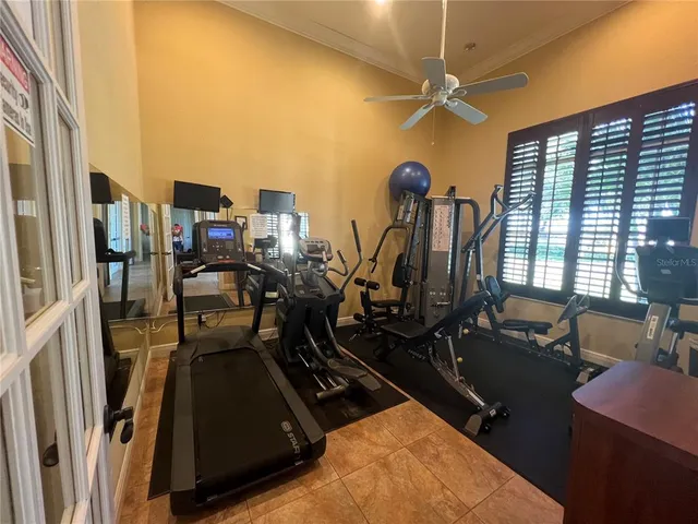 a kitchen with a sink a window and cabinets