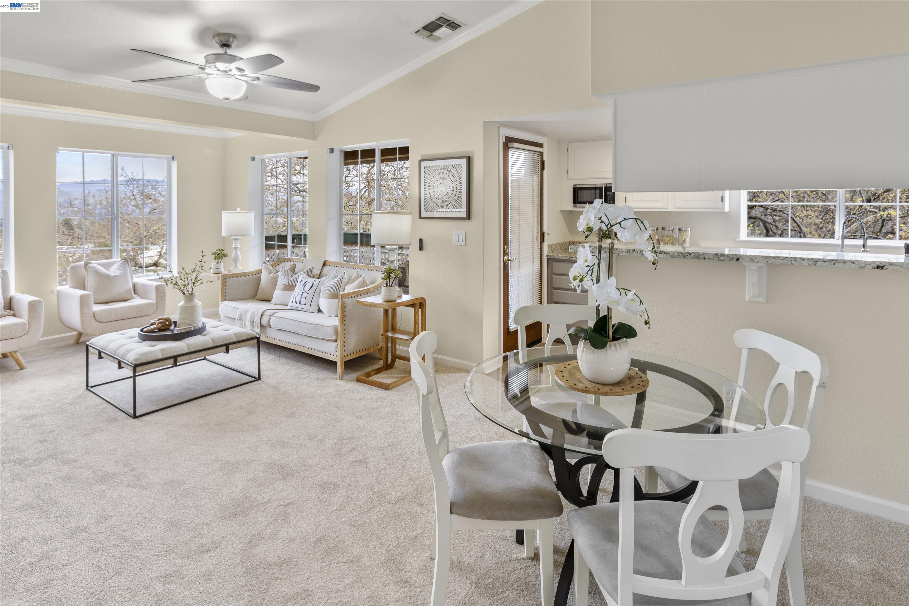 113 Stone Pine Lane San Ramon, CA 94583 - Photo 13 of 31 a living room with furniture and a chandelier