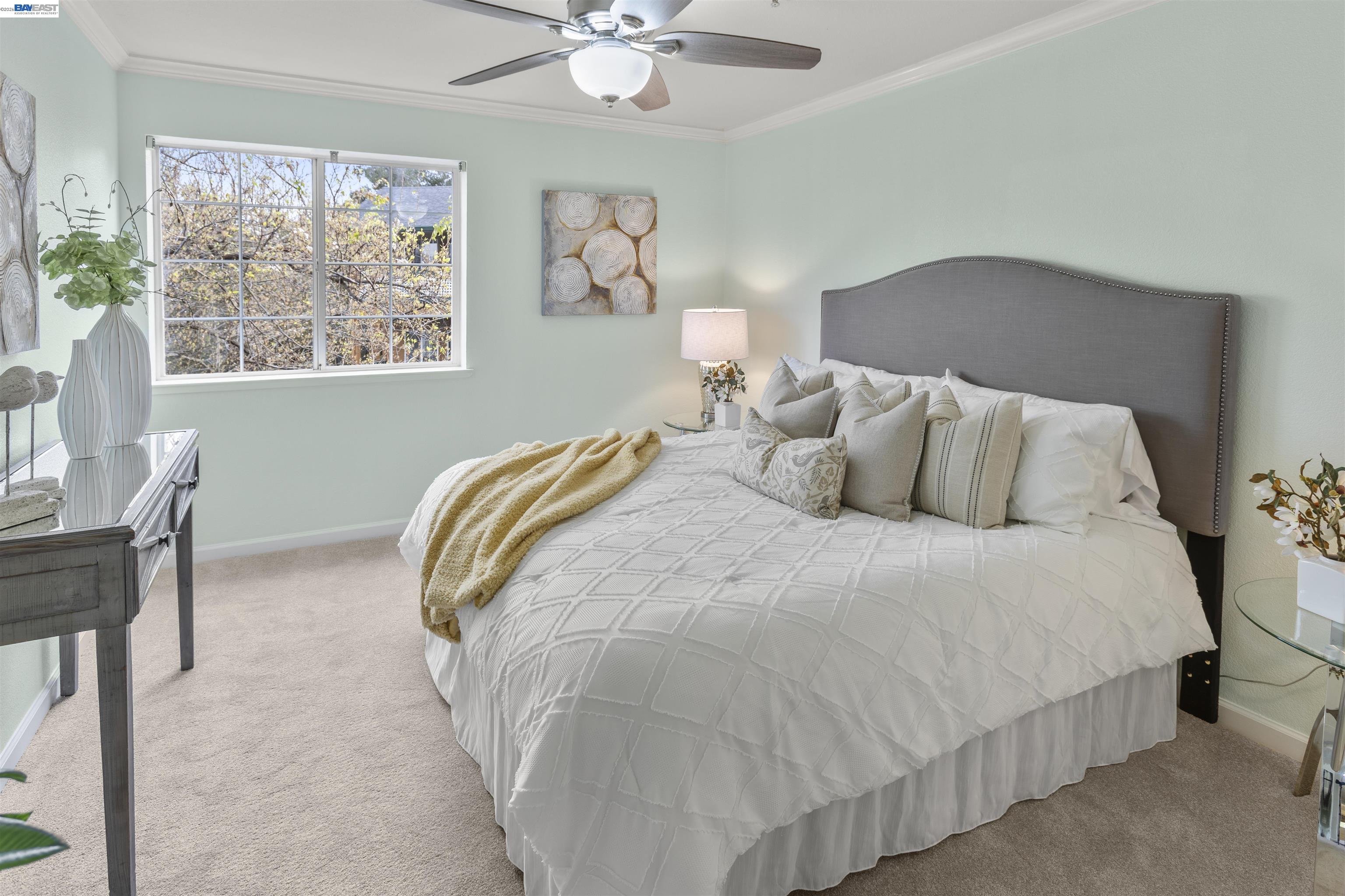 113 Stone Pine Lane San Ramon, CA 94583 - Photo 19 of 31 a bedroom with a bed and a chandelier