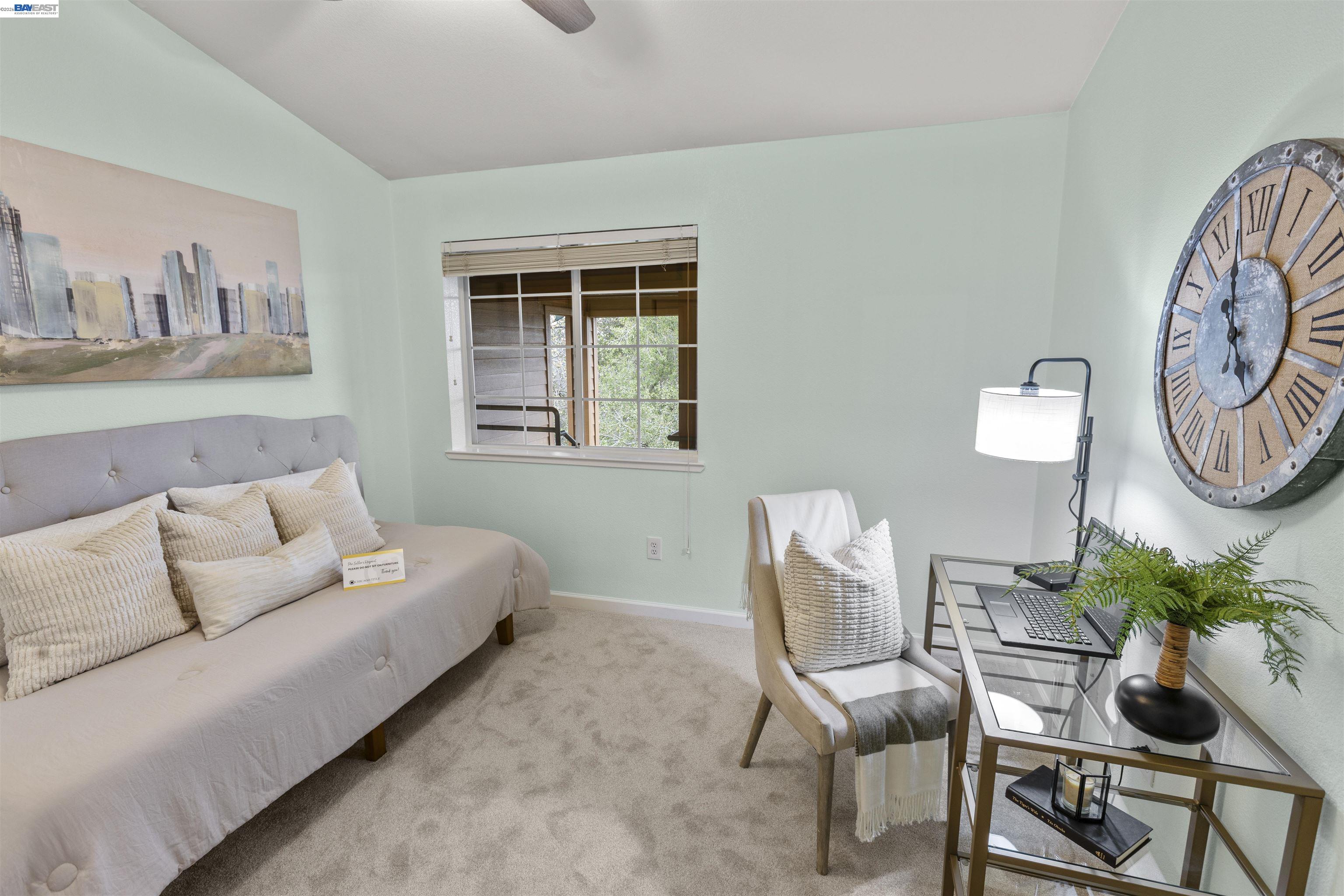 113 Stone Pine Lane San Ramon, CA 94583 - Photo 20 of 31 a living room with furniture a wall clock and a window