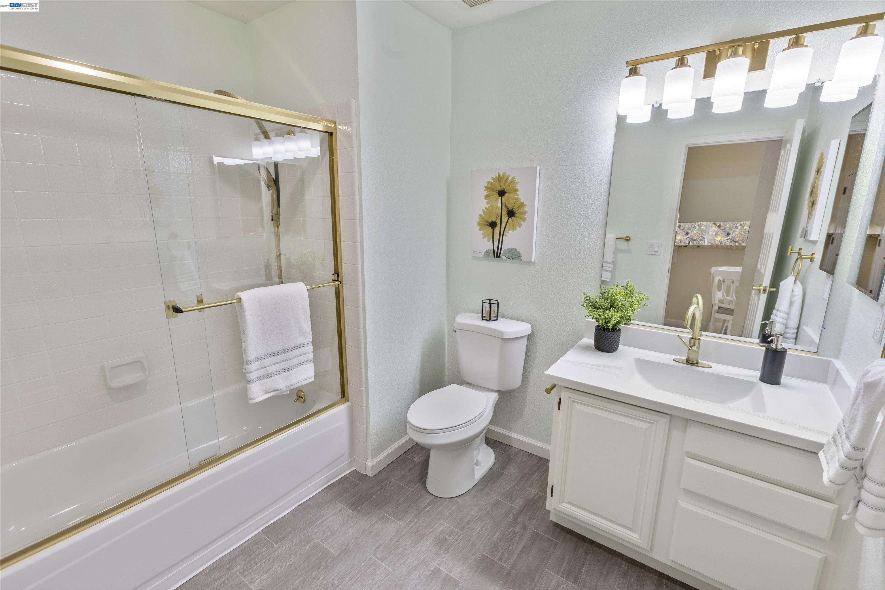 113 Stone Pine Lane San Ramon, CA 94583 - Photo 21 of 31 a bathroom with a sink toilet and shower