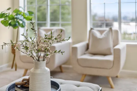 a vase of flowers sitting on a table