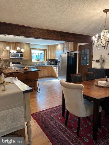 a view of a dining room with furniture