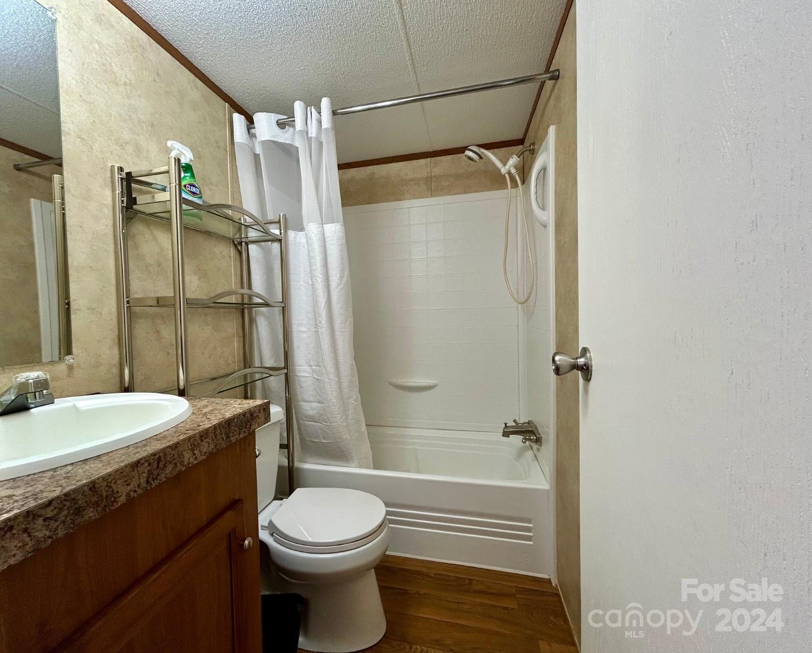 7486 Buff Allen Road Hickory, NC 28602 - Photo 8 of 13 a bathroom with a sink toilet and shower
