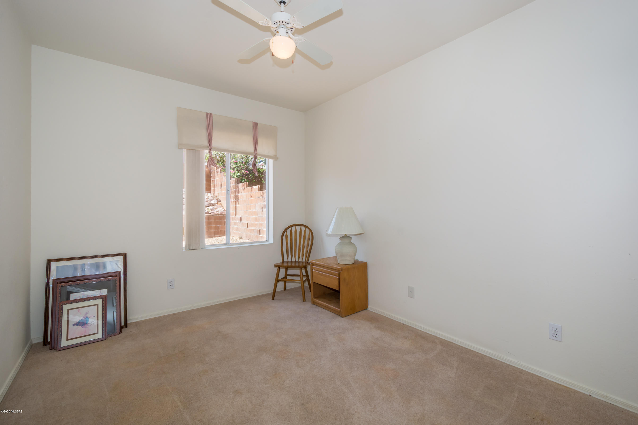 11341 Silver Pheasant Loop Oro Valley, AZ 85737 - Photo 31 of 41 a living room with furniture and a window
