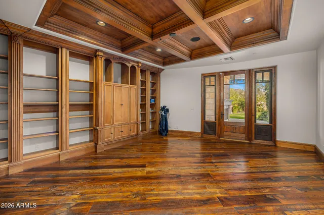 a view of a entryway door of the room