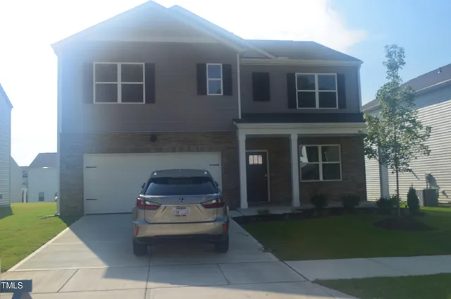 a car parked in front of house