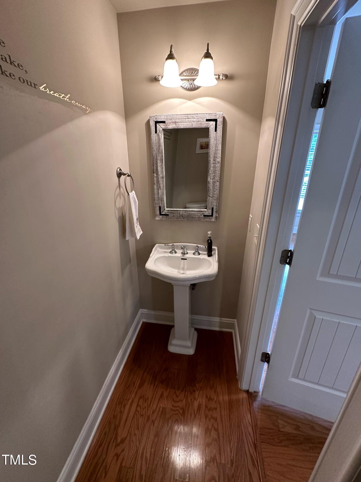 7833 ACC Boulevard Raleigh, NC 27617 - Photo 15 of 38 powder room