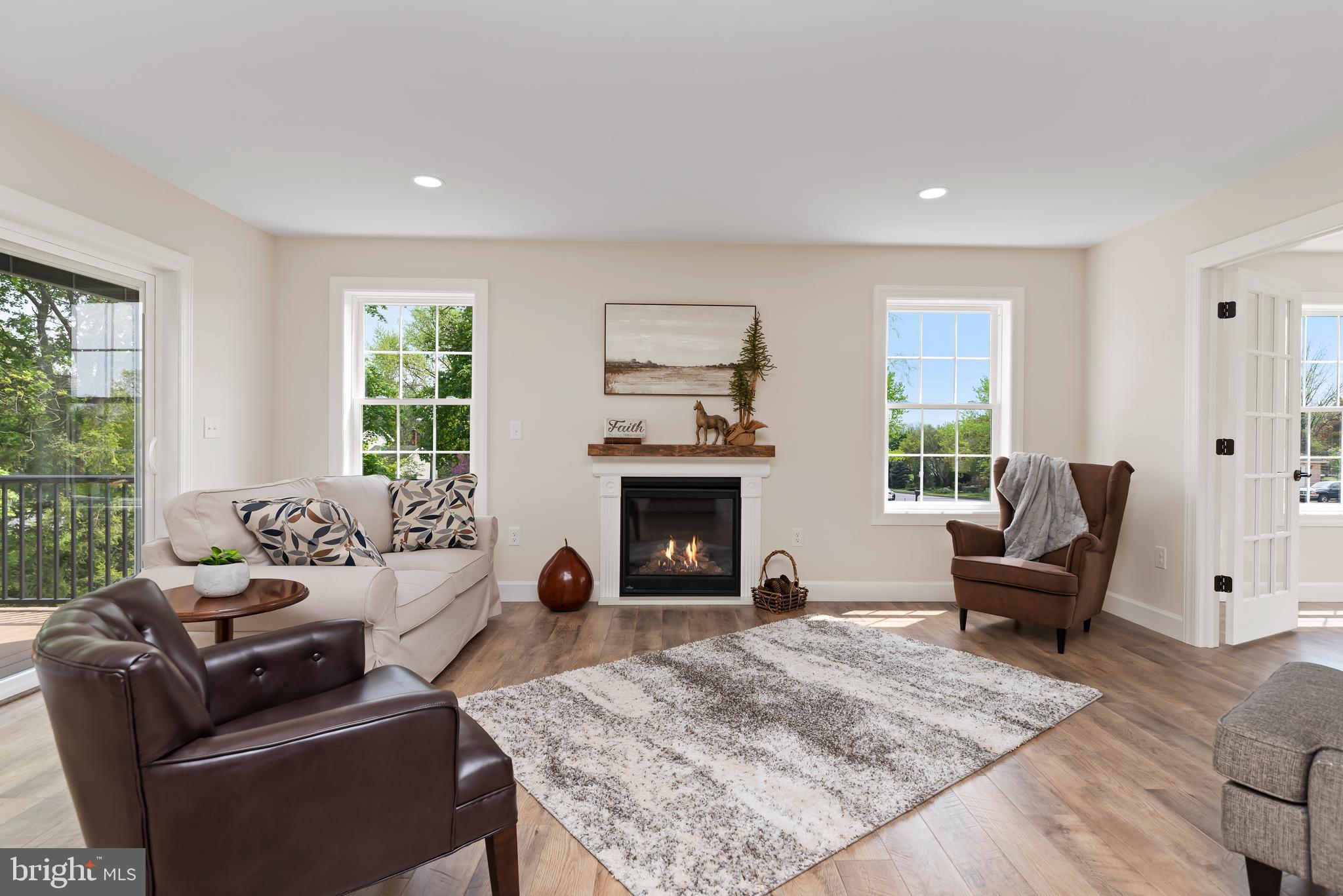 423 Meeting House Spring Road Carlisle, PA 17013 - Photo 22 of 68 Gas fireplace adds ambiance in the living room