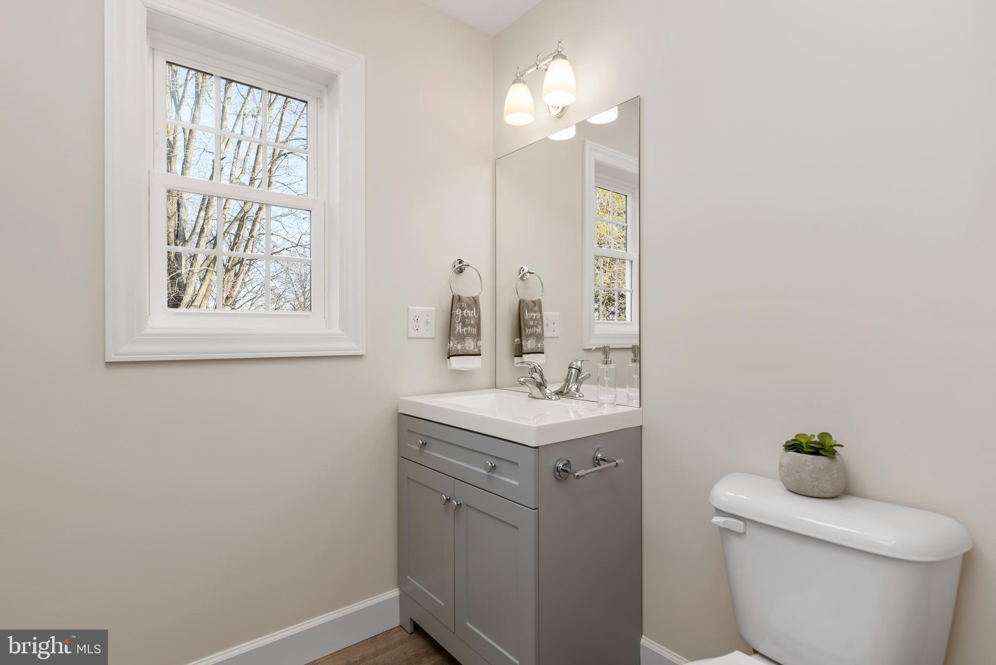 423 Meeting House Spring Road Carlisle, PA 17013 - Photo 34 of 68 Half bath / laundry on first floor