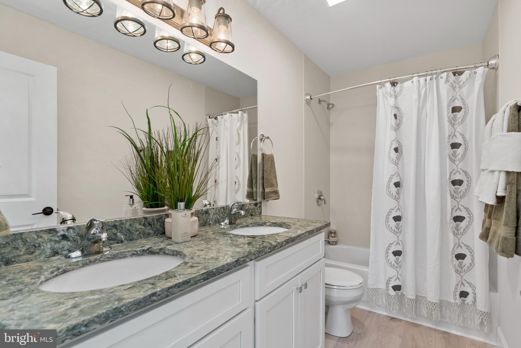 423 Meeting House Spring Road Carlisle, PA 17013 - Photo 54 of 68 2nd full bath w/dbl vanity & upgraded tub/shower