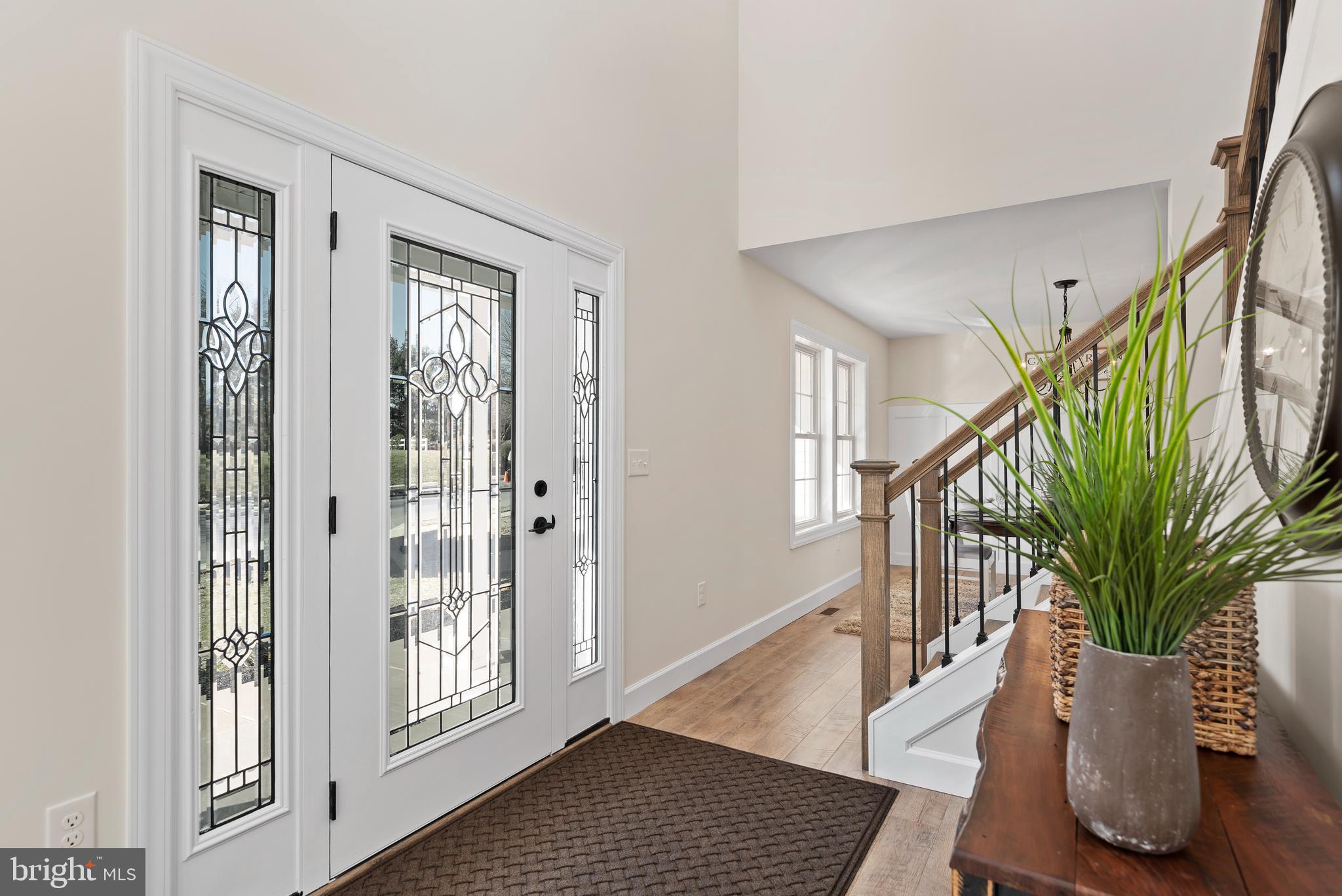 423 Meeting House Spring Road Carlisle, PA 17013 - Photo 8 of 68 Open foyer views the formal dining & flex room.