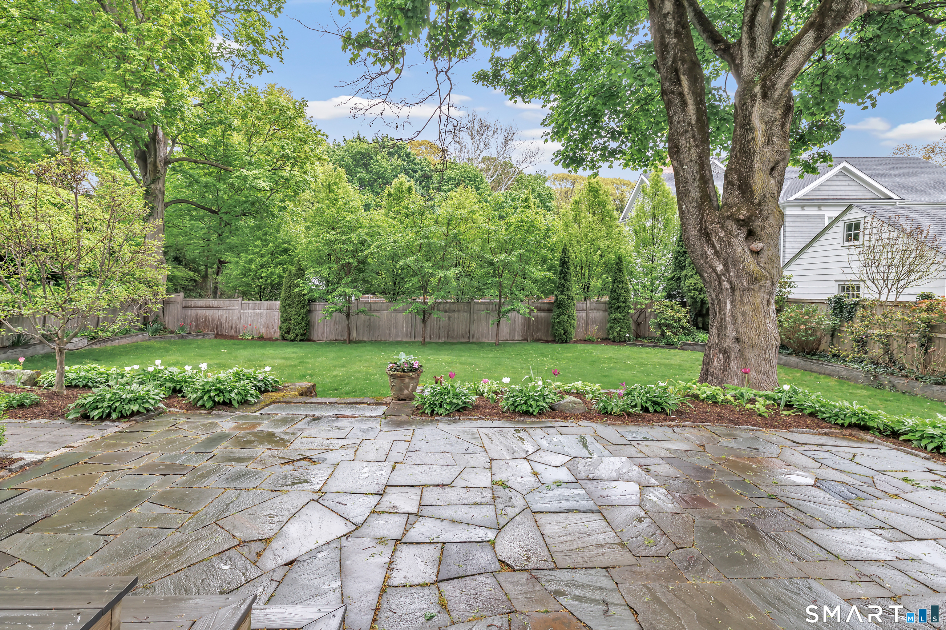 464 Round Hill Road Fairfield, CT 06824 - Photo 4 of 40 Gorgeous mature perennial gardens and large stone patio.