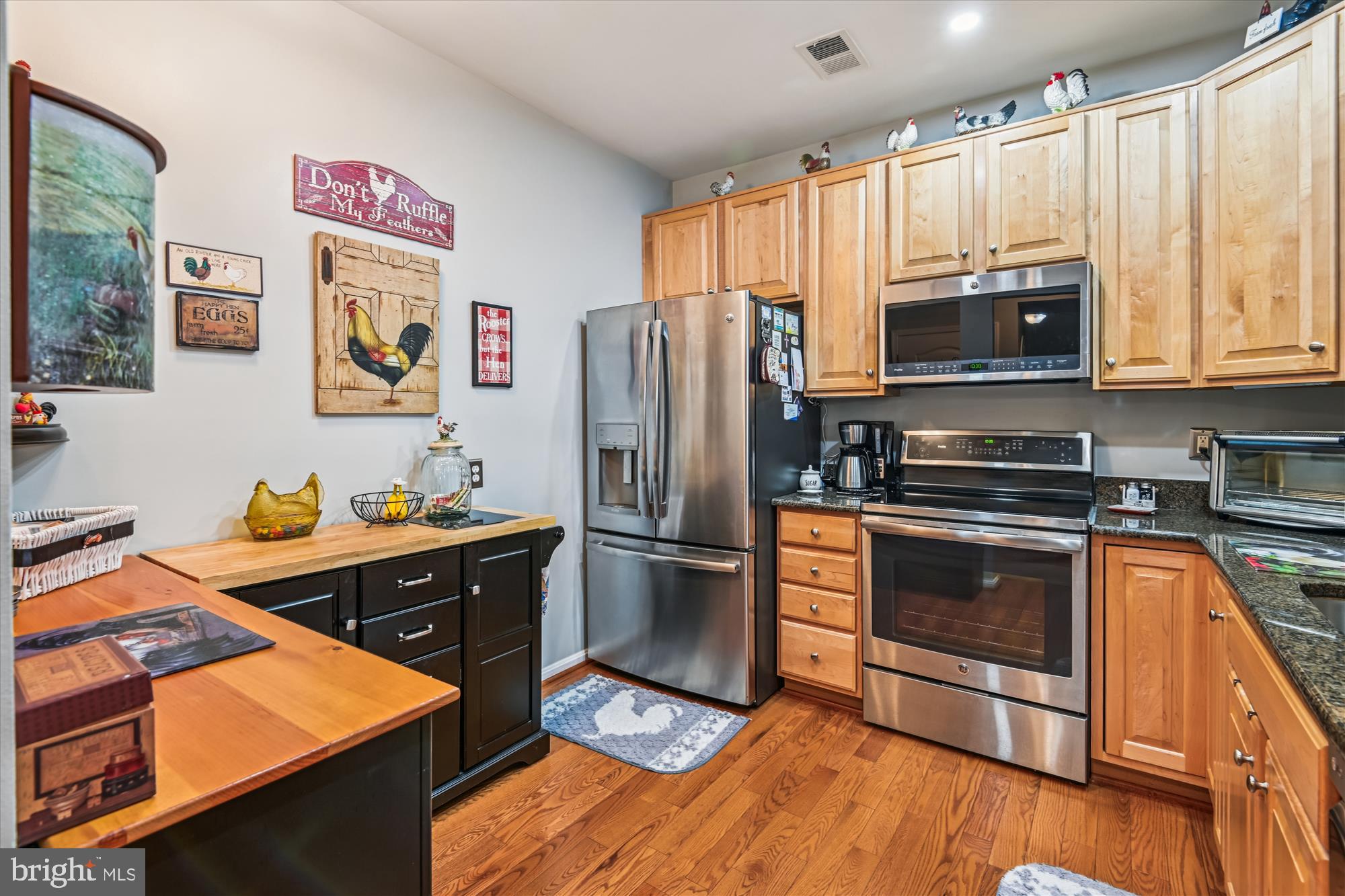 Kitchen with hardwood flooring