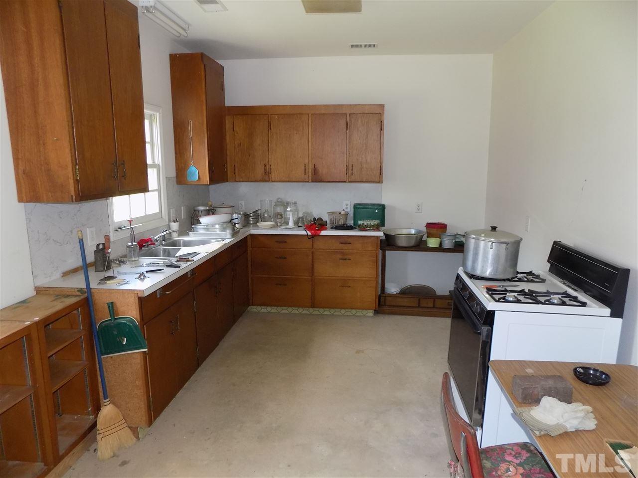 5820 Penny Road Raleigh, NC 27606 - Photo 21 of 27 Full Kitchen in detached garage.