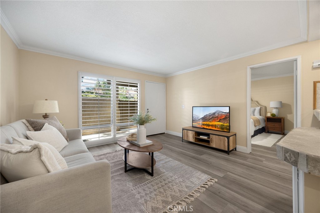 3020 Associated Road, Unit 110 Fullerton, CA 92835 - Photo 19 of 34 a living room with furniture and a window
