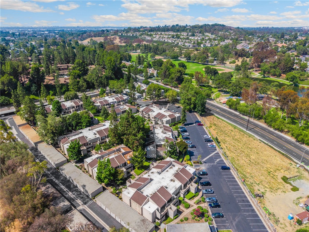 3020 Associated Road, Unit 110 Fullerton, CA 92835 - Photo 30 of 34 an aerial view of residential house with outdoor space and river