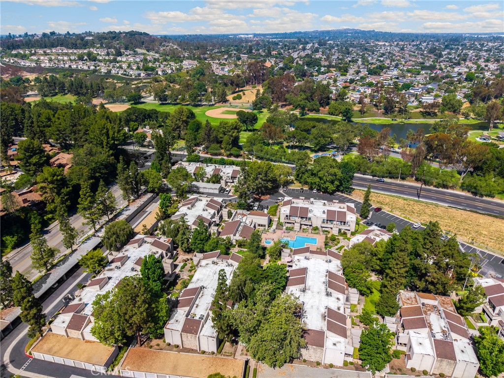 3020 Associated Road, Unit 110 Fullerton, CA 92835 - Photo 31 of 34 an aerial view of a city with lots of residential buildings