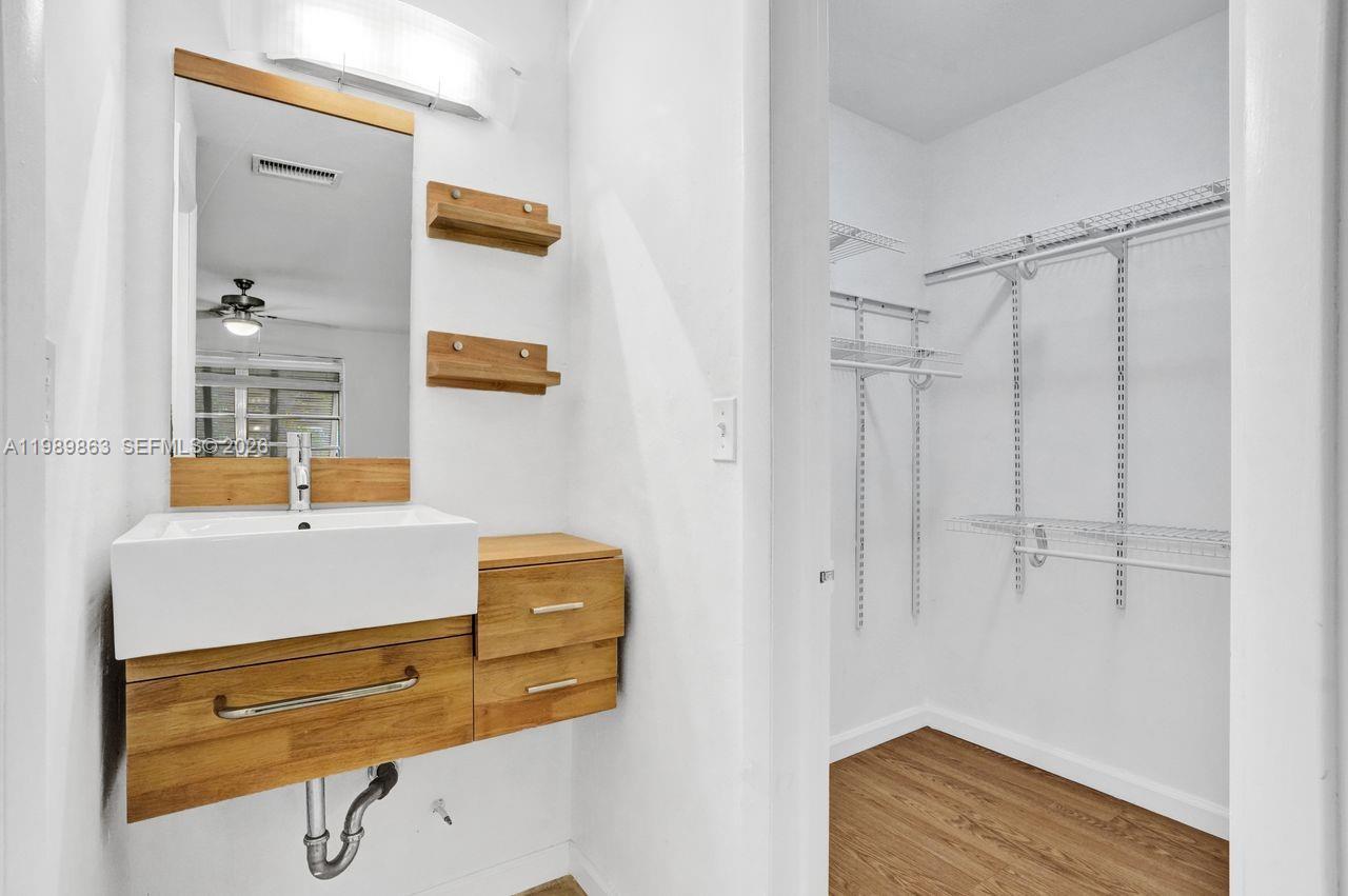 9454 Southwest 77th Avenue, Unit S1 Miami, FL 33156 - Photo 11 of 20 a bathroom with a shower
