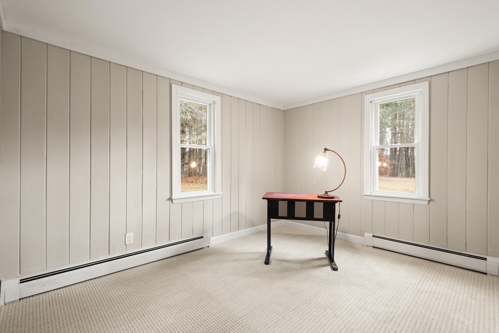 319 Pleasant Street Dunstable, MA 01827 - Photo 21 of 36 a bedroom with furniture and a window