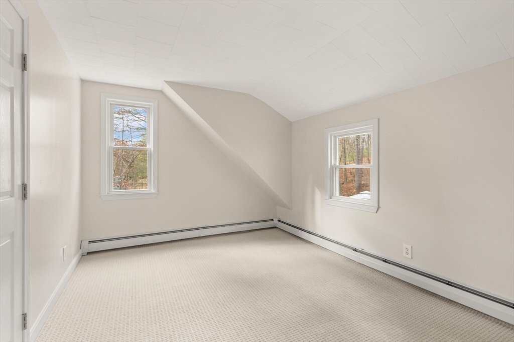 319 Pleasant Street Dunstable, MA 01827 - Photo 27 of 36 an empty room with windows