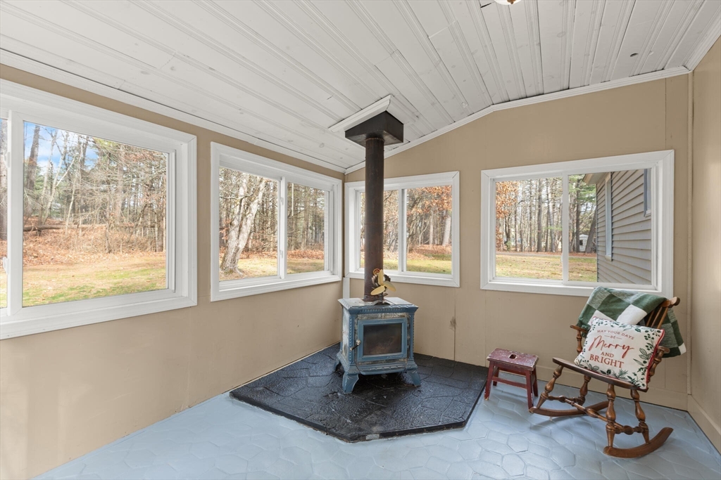 319 Pleasant Street Dunstable, MA 01827 - Photo 31 of 36 a living room with furniture and a window