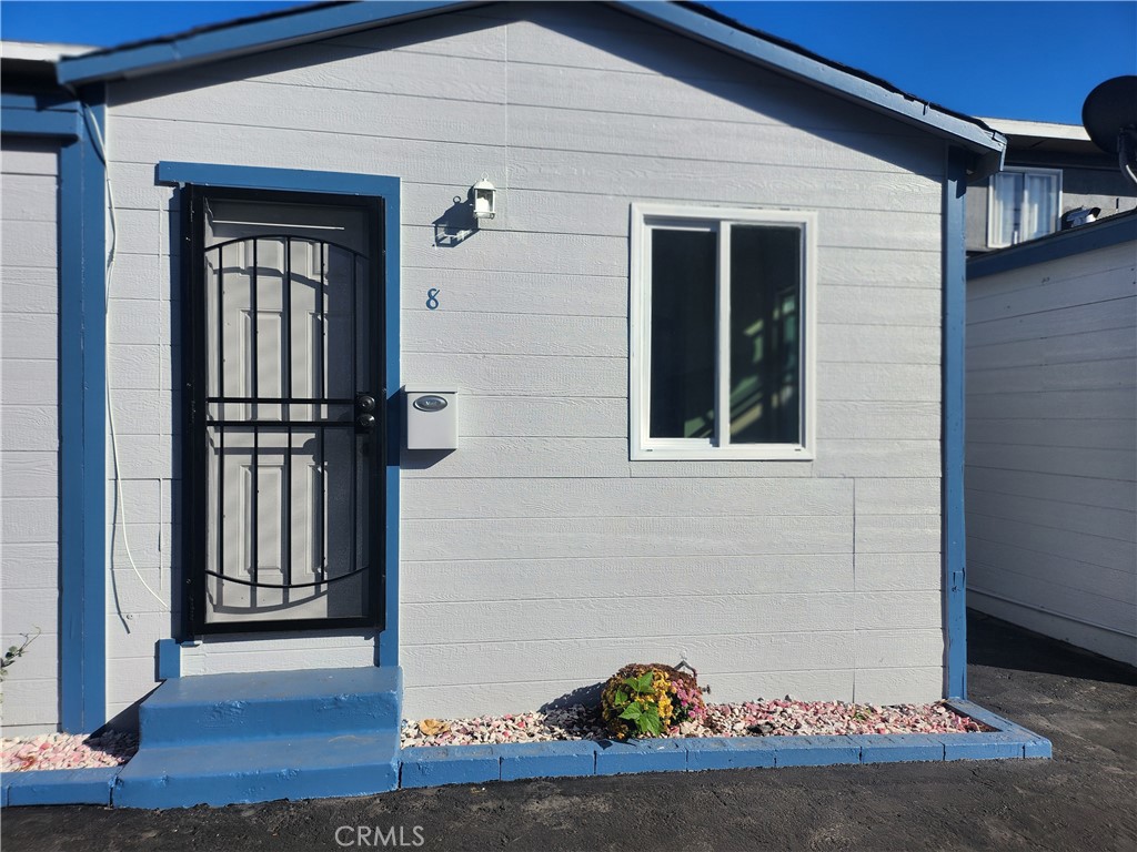 3717 West Imperial Highway, Unit 8 Inglewood, CA 90303 - Photo 1 of 7 a view of entryway with wooden floor