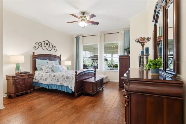 a bathroom with a granite countertop sink and a bathtub