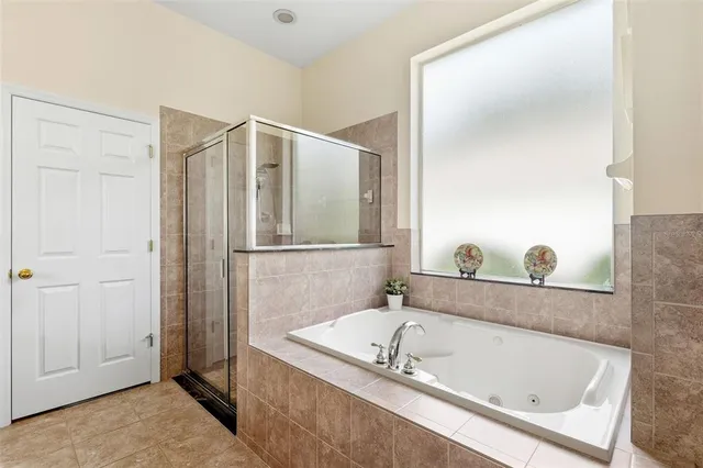 a bedroom with a bed and a closet