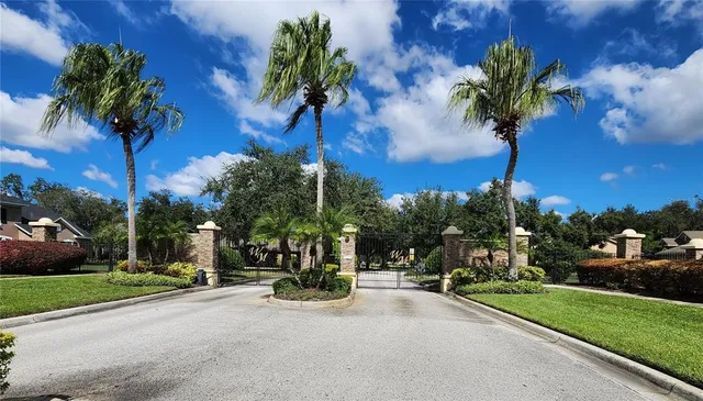 a picture of a room with a white wall and a painting