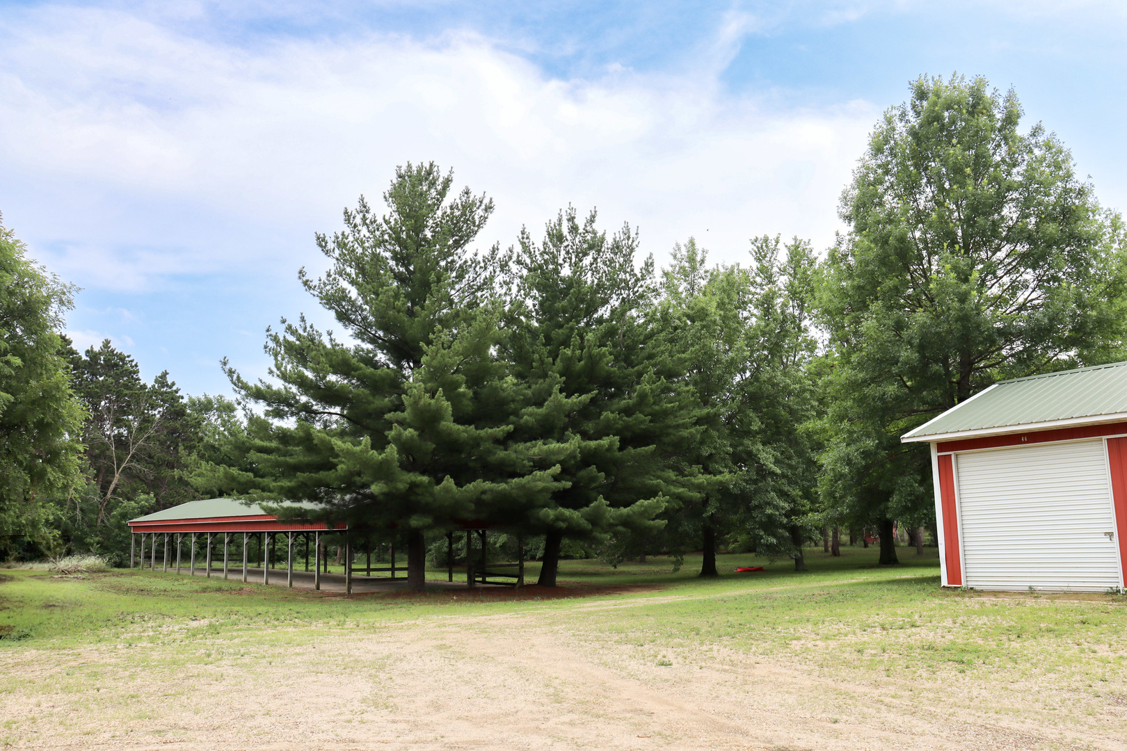 23148 Waller Road Fulton, IL 61252 - Photo 4 of 10 a view of a swimming pool with a lawn chairs and a table