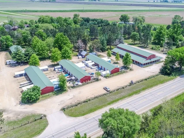 an aerial view of a house and outdoor space