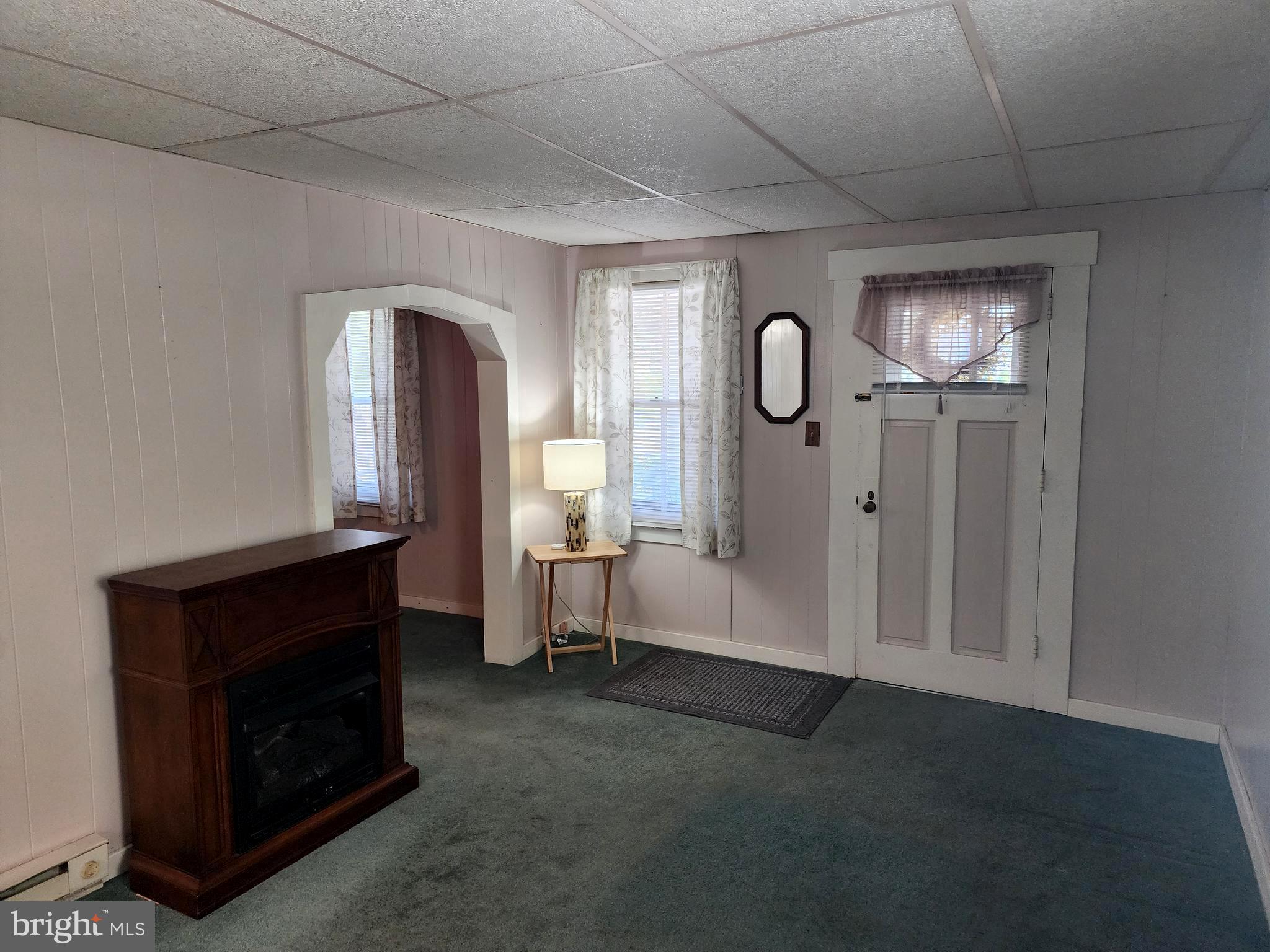 14403 Ellerslie Road Ellerslie, MD 21529 - Photo 15 of 34 a view of livingroom with furniture and a fireplace