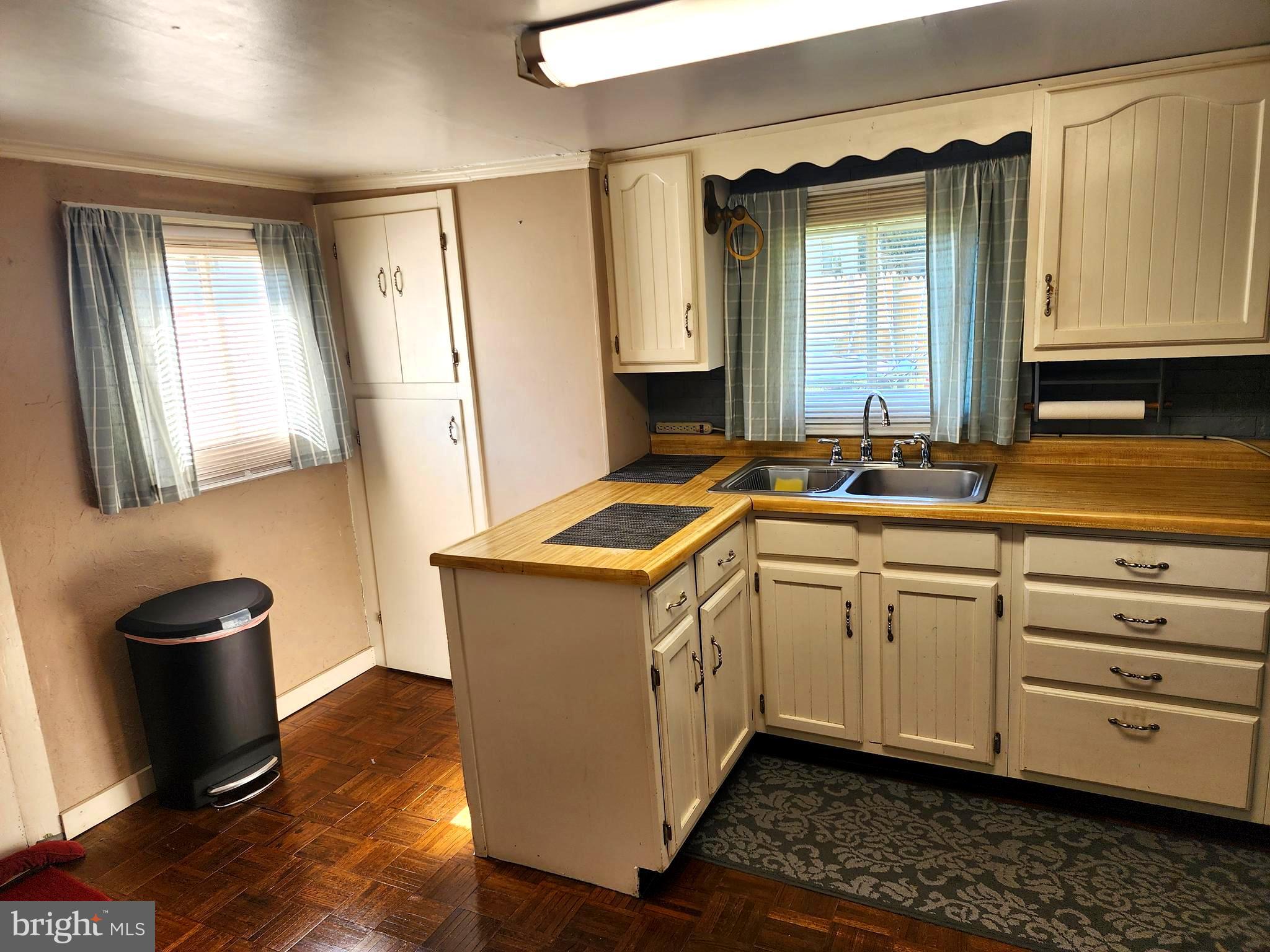 14403 Ellerslie Road Ellerslie, MD 21529 - Photo 24 of 34 a kitchen with granite countertop cabinets stainless steel appliances a sink and a counter top space