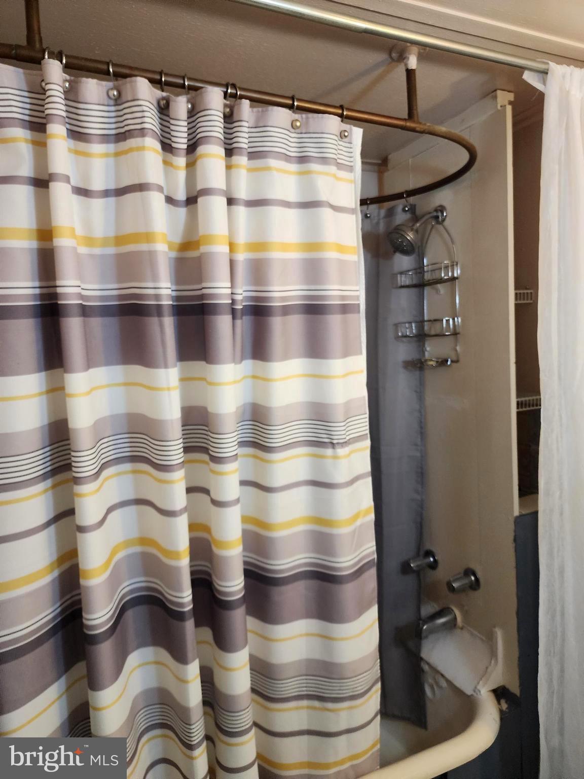 14403 Ellerslie Road Ellerslie, MD 21529 - Photo 29 of 34 a bathroom with a sink and a shower