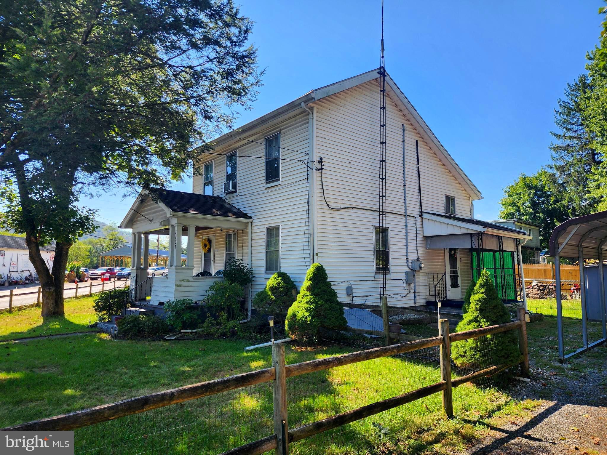 14403 Ellerslie Road Ellerslie, MD 21529 - Photo 10 of 34 a view of a house with backyard and sitting area