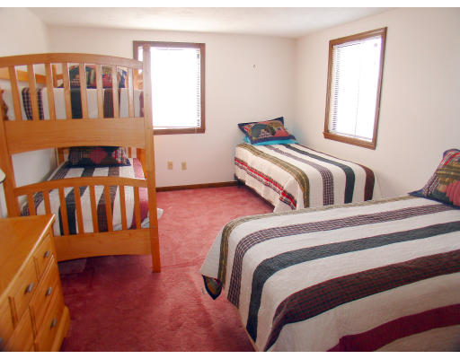 165 Turner Road Scituate, MA 02066 - Photo 14 of 15 a bedroom with two beds and a window