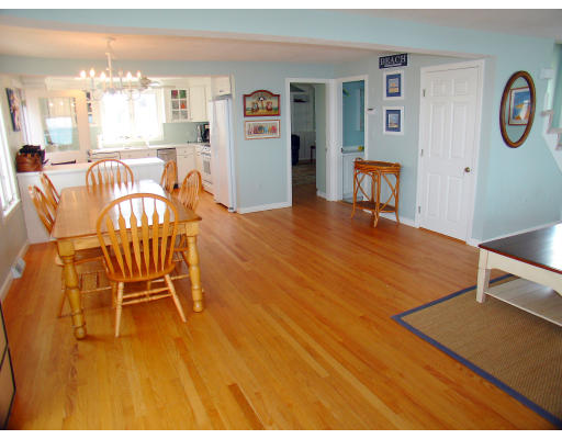165 Turner Road Scituate, MA 02066 - Photo 5 of 15 a room with a table chairs and a view of kitchen