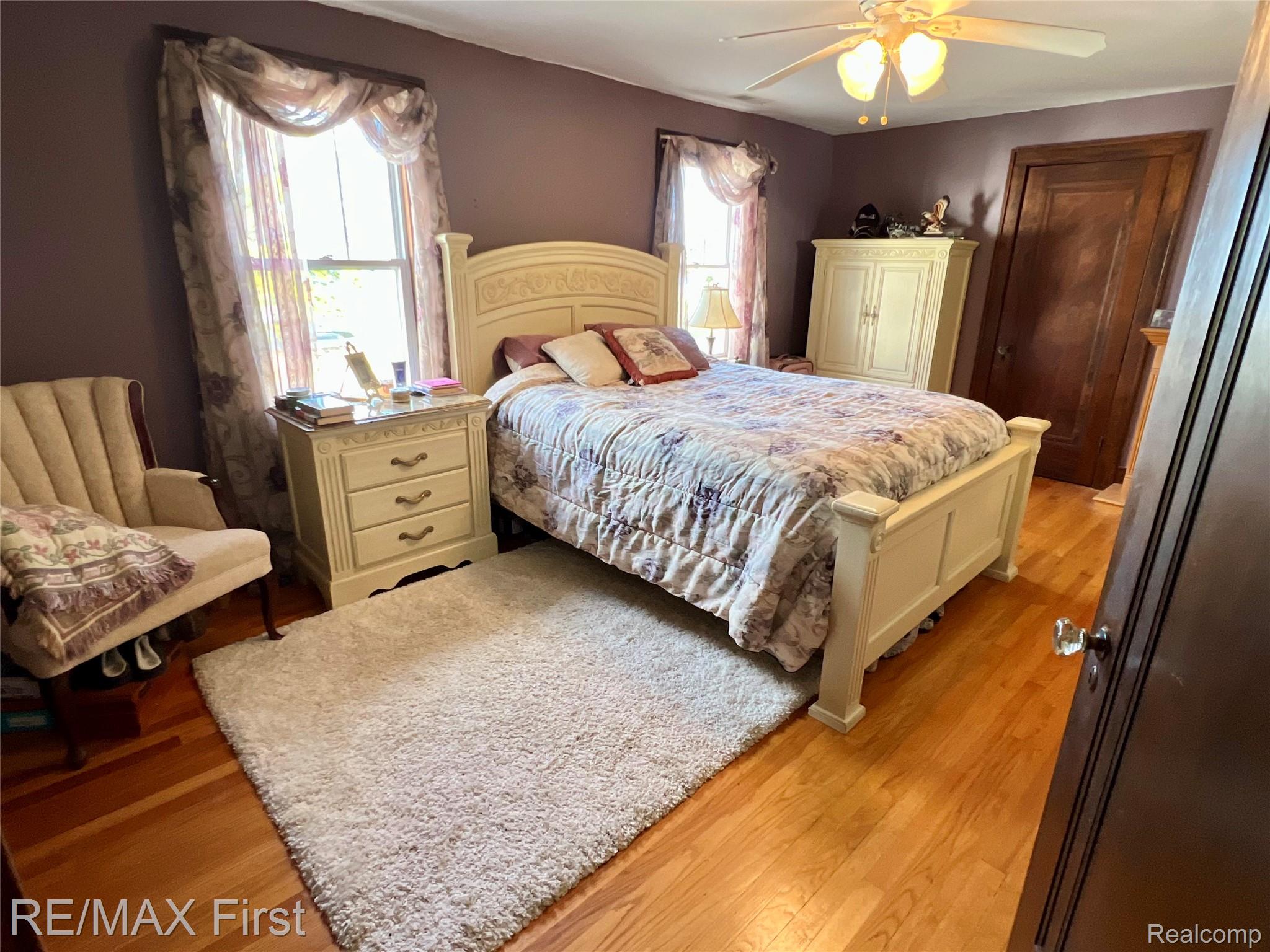 9280 River Road Algonac, MI 48001 - Photo 29 of 44 Bedroom with light wood-type flooring and ceiling fan