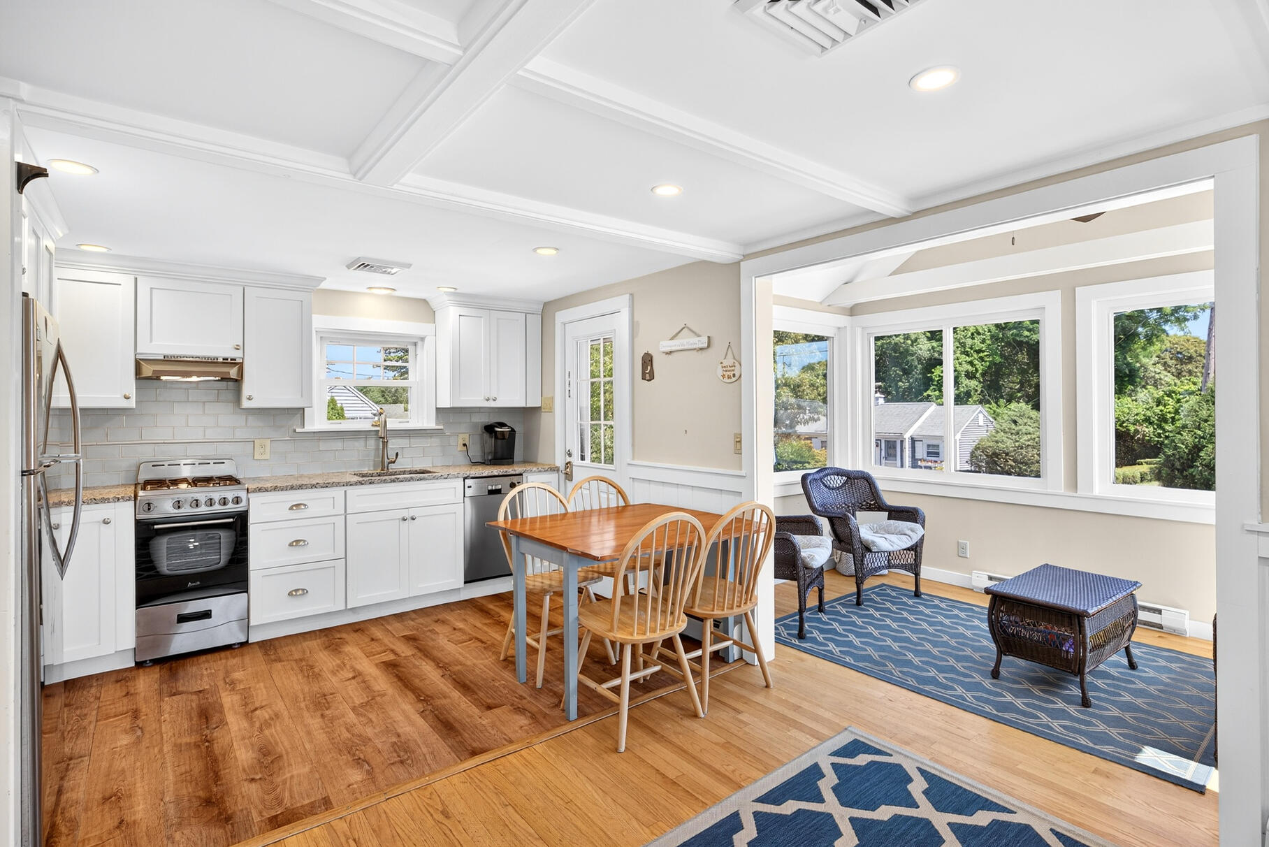 13 Garden Lane Dennis Port, MA 02639 - Photo 15 of 43 a view of a dining room with furniture window and wooden floor