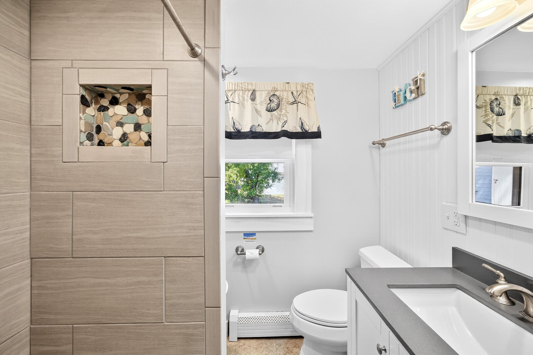 13 Garden Lane Dennis Port, MA 02639 - Photo 23 of 43 a bathroom with a toilet sink and mirror