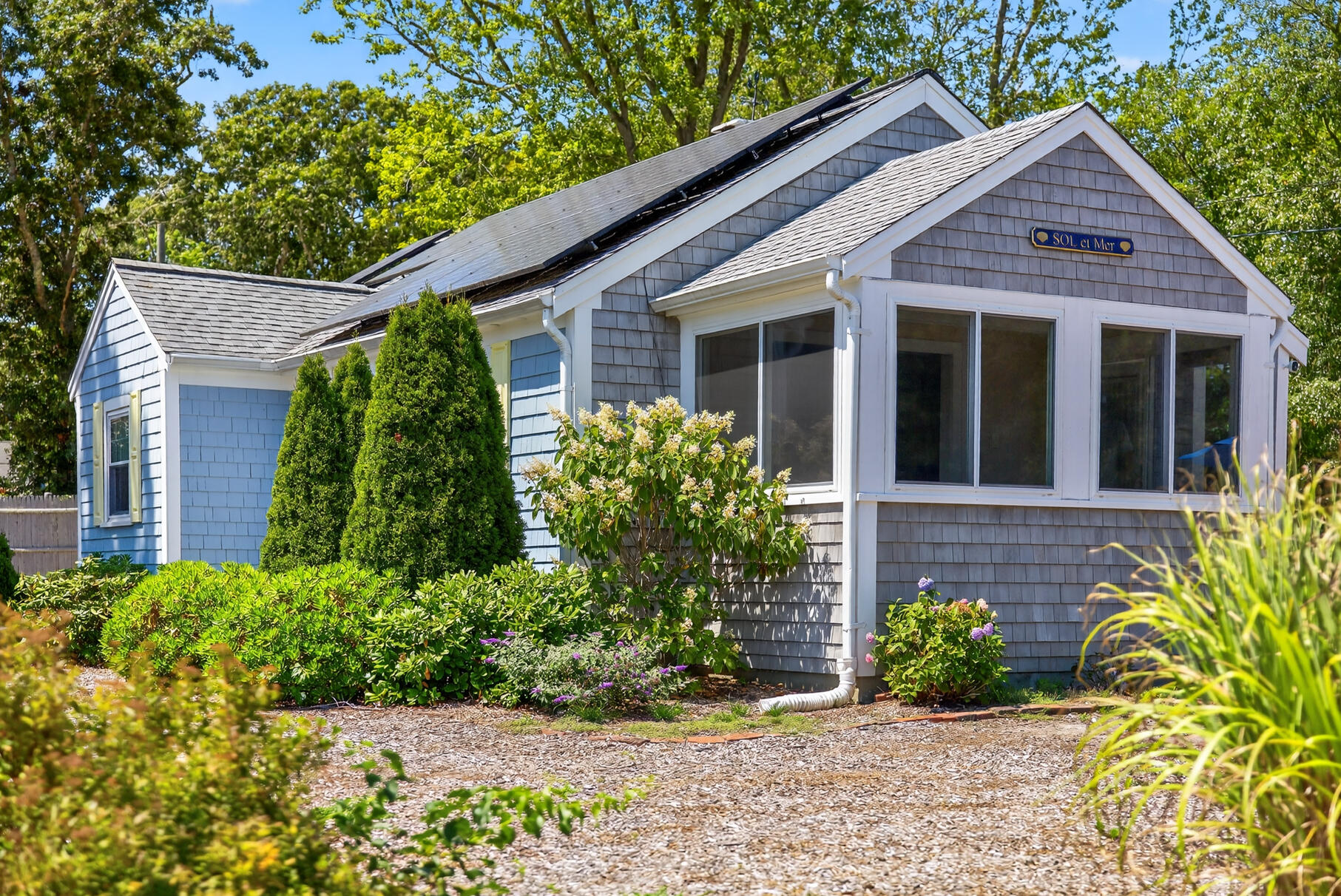 13 Garden Lane Dennis Port, MA 02639 - Photo 27 of 43 a front view of a house with garden