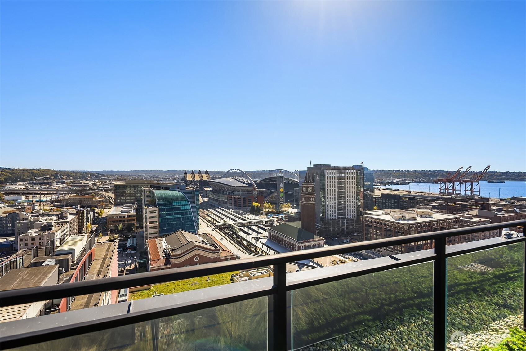 450 South Main Street, Unit 618 Seattle, WA 98104 - Photo 19 of 40 a view of a city from a balcony