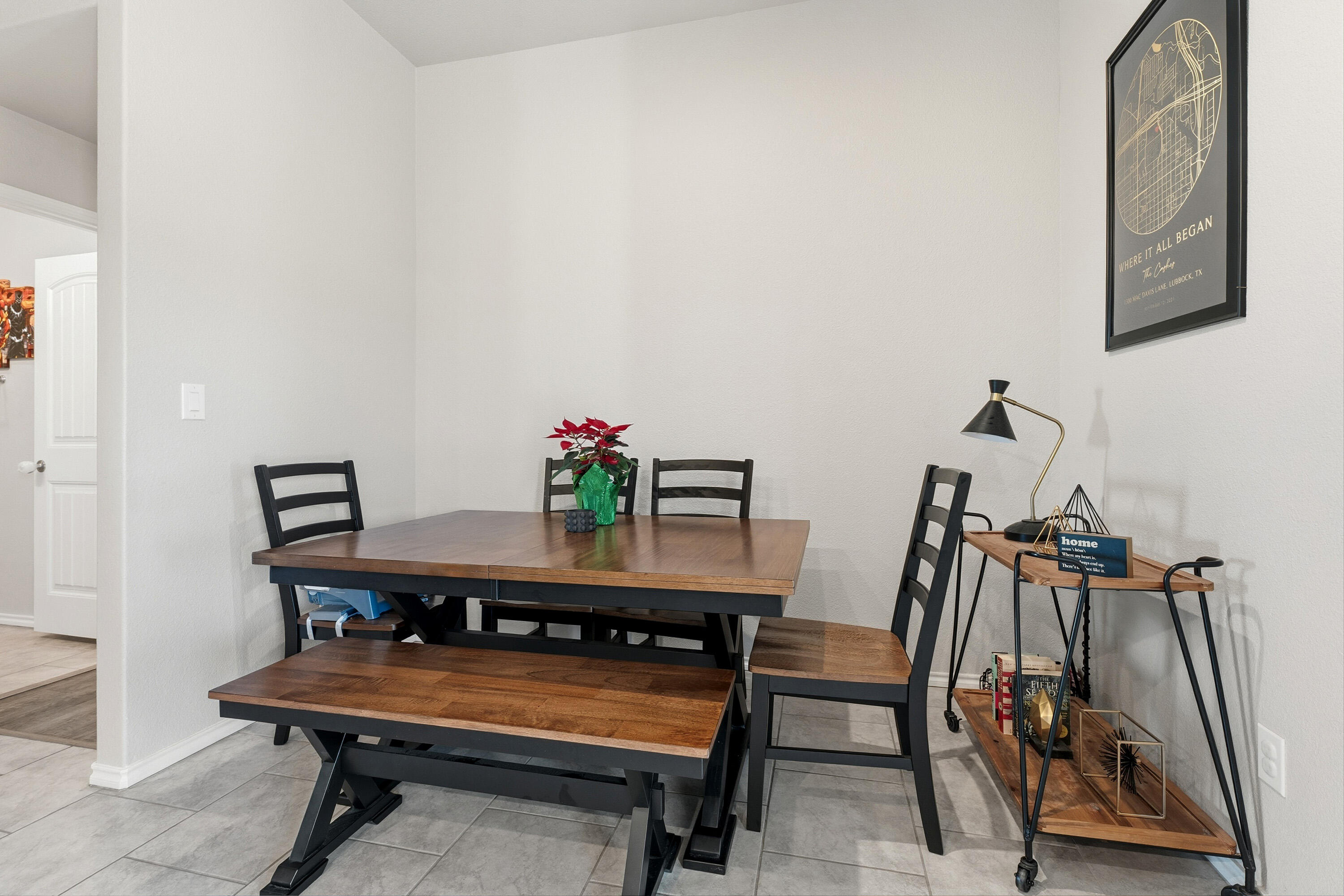 6827 39th Street Lubbock, TX 79407 - Photo 12 of 25 a view of a room with furniture and wooden floor